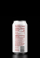 A white aluminum can of coffee shown from the back, displaying the nutrition facts label in red and black text against a solid black background.